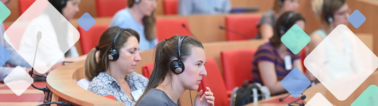 Group of people concentrating on a conference
